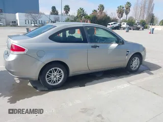 2008 Ford Focus SE with VIN 1FAHP33NX8W135881, listed as a IAAI auction lot 41668949 with 160,261 mi miles. Bid and sale history available at carsss.com. Image 4.
