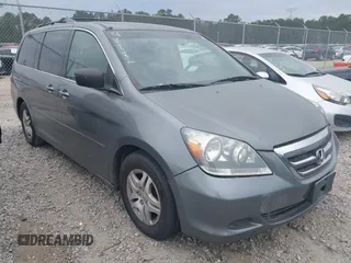 2007 Honda Odyssey EX-L z VIN 5FNRL38617B436585, wystawiony jako IAAI lot #42203755 z przebiegiem 182 706 mil mil oraz . Historia ofert i sprzedaży dostępna na DreamBid. Obrazek 1.