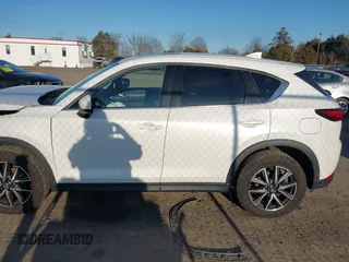 2018 Mazda CX-5 S Premium with VIN JM3KFBDM8J1419006, listed as a IAAI auction lot 41498658 with 123,622 mi miles and . Bid and sale history available at DreamBid. Image 15.
