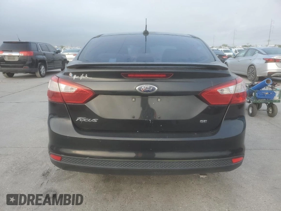 2014 Ford Focus SE with VIN 1FADP3F24EL324006, listed as a Copart auction lot 51219835 with 148,264 mi miles and Salvage Title. Bid and sale history available at carsss.com. Image 6.