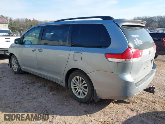 2013 Toyota Sienna XLE AAS with VIN 5TDYK3DC1DS391293, listed as a IAAI auction lot 41694041 with 181,913 mi miles. Bid and sale history available at carsss.com. Image 3.