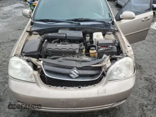 2007 Suzuki Forenza z VIN KL5JD56Z07K657218, wystawiony jako Copart lot #86767854 z przebiegiem 93 044 mil mil oraz Szkoda całkowita • Salvage title. Historia ofert i sprzedaży dostępna na DreamBid. Obrazek 11.