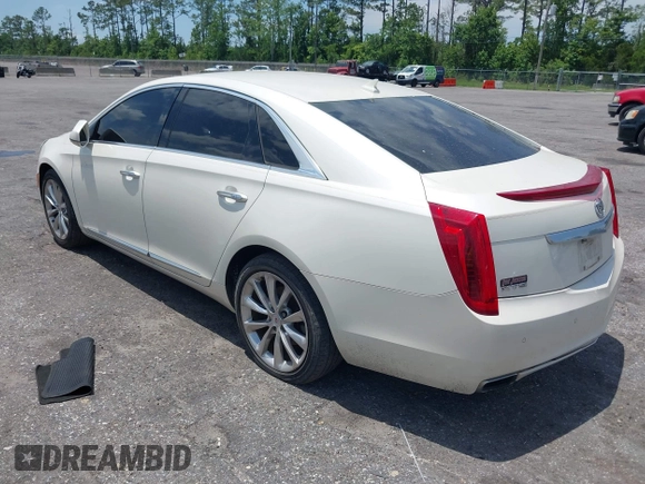 2013 Cadillac XTS Luxury with VIN 2G61P5S38D9160016, listed as a IAAI auction lot 42192602 with 134,879 mi miles and . Bid and sale history available at DreamBid. Image 3.