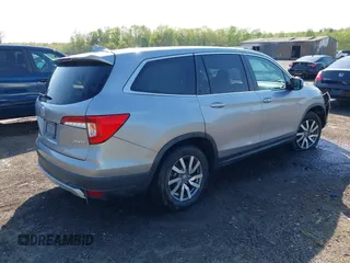 2020 Honda Pilot EX-L z VIN 5FNYF6H57LB059699, wystawiony jako IAAI lot #42026669 z przebiegiem 46 906 mil mil oraz . Historia ofert i sprzedaży dostępna na DreamBid. Obrazek 4.