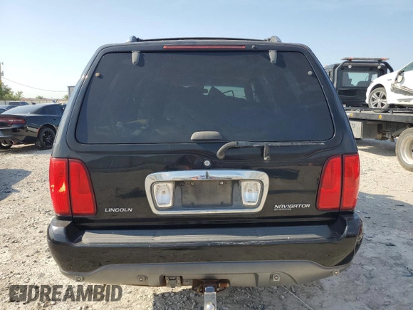 2002 Lincoln Navigator z VIN 5LMFU28R32LJ14694, wystawiony jako Copart lot #66689144 z przebiegiem 212 346 mil mil oraz Szkoda całkowita • Salvage title. Historia ofert i sprzedaży dostępna na DreamBid. Obrazek 6.