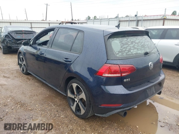 2018 Volkswagen Golf GTI S with VIN 3VW447AUXJM275709, listed as a IAAI auction lot 41282474 with 136,496 mi miles. Bid and sale history available at carsss.com. Image 3.