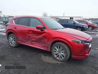 2023 Mazda CX-5 Signature with VIN JM3KFBXY3P0282456, listed as a IAAI auction lot 41542915 with 3,376 mi miles and . Bid and sale history available at carsss.com. Image 6.