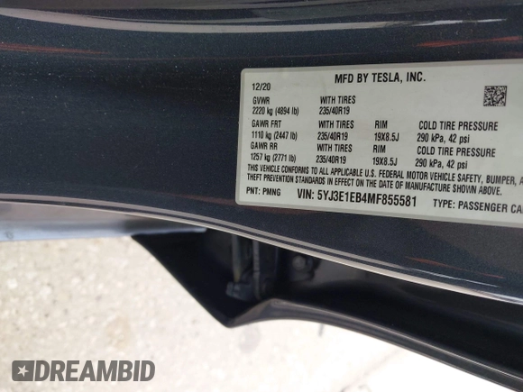 2021 Tesla Model 3 Long Range with VIN 5YJ3E1EB4MF855581, listed as a IAAI auction lot 41974515 with 71,561 mi miles. Bid and sale history available at carsss.com. Image 9.