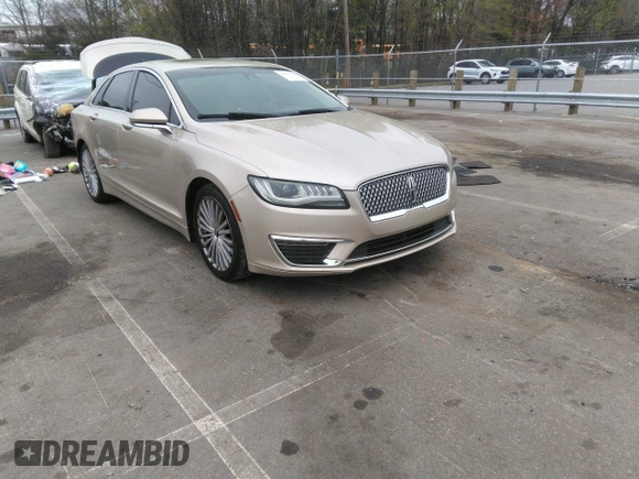 2017 Lincoln MKZ Reserve z VIN 3LN6L5E94HR615115, wystawiony jako IAAI lot #41947698 z przebiegiem 122 090 mil mil oraz . Historia ofert i sprzedaży dostępna na DreamBid. Obrazek 1.