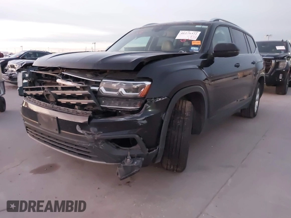 2018 Volkswagen Atlas SE with VIN 1V2DR2CA8JC536295, listed as a IAAI auction lot 41275322 with 166,684 mi miles and . Bid and sale history available at DreamBid. Image 2.