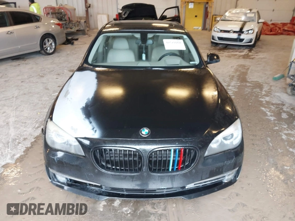 2013 BMW 7 Series 750i xDrive z VIN WBAYB6C56DC997904, wystawiony jako IAAI lot #42529968 z przebiegiem Nie podano mil oraz . Historia ofert i sprzedaży dostępna na DreamBid. Obrazek 11.