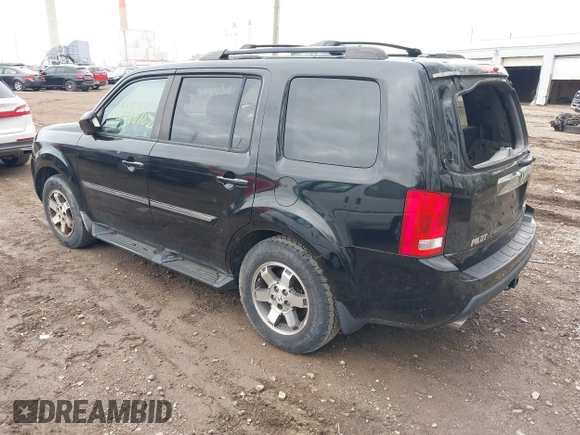 2009 Honda Pilot Touring with VIN 5FNYF48959B016978, listed as a IAAI auction lot 41947782 with 234,115 mi miles and . Bid and sale history available at carsss.com. Image 3.
