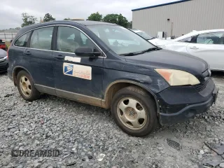 2009 Honda CR-V LX z VIN 5J6RE38309L015015, wystawiony jako Copart lot #56763035 z przebiegiem 211 946 mil mil oraz Szkoda całkowita • Salvage title. Historia ofert i sprzedaży dostępna na DreamBid. Obrazek 4.