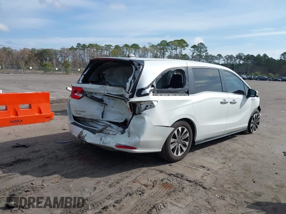 2022 Honda Odyssey EX-L with VIN 5FNRL6H7XNB027850, listed as a IAAI auction lot 41723046 with 84,299 mi miles and . Bid and sale history available at DreamBid. Image 4.