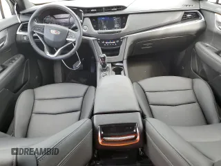 2024 Cadillac XT6 FWD Luxury with VIN 1GYKPAR4XRZ746989, listed as a Copart auction lot 77325614 with 2,234 mi miles and Salvage Title. Bid and sale history available at carsss.com. Image 8.