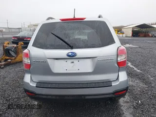 2014 Subaru Forester 2.5i Premium with VIN JF2SJAEC4EH542243, listed as a IAAI auction lot 41858364 with 100,095 mi miles. Bid and sale history available at carsss.com. Image 16.