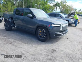 2022 Rivian R1T Launch Edition with VIN 7FCTGAAL9NN004060, listed as a IAAI auction lot 41637884 with 40,268 mi miles. Bid and sale history available at carsss.com. Image 1.