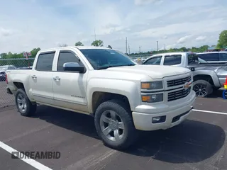 2015 Chevrolet Silverado 1500 LT with VIN 3GCUKREC1FG392218, listed as a IAAI auction lot 42094309 with 140,915 mi miles and . Bid and sale history available at DreamBid. Image 13.