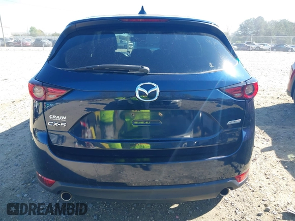 2018 Mazda CX-5 Grand Touring with VIN JM3KFADM1J0322049, listed as a IAAI auction lot 41891079 with 174,939 mi miles and . Bid and sale history available at DreamBid. Image 16.