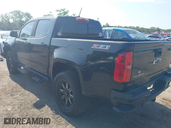 2020 Chevrolet Colorado 2WD Z71 z VIN 1GCGSDEN2L1122555, wystawiony jako IAAI lot #42096724 z przebiegiem 120 679 mil mil oraz . Historia ofert i sprzedaży dostępna na DreamBid. Obrazek 3.