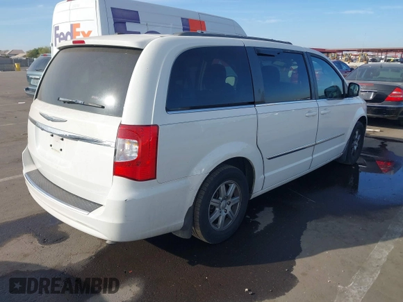 2012 Chrysler Town & Country Touring z VIN 2C4RC1BGXCR410507, wystawiony jako IAAI lot #41215704 z przebiegiem 161 501 mil mil oraz . Historia ofert i sprzedaży dostępna na DreamBid. Obrazek 4.