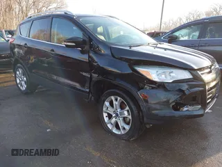 2014 Ford Escape Titanium with VIN 1FMCU0JX0EUC21512, listed as a IAAI auction lot 41781026 with 142,771 mi miles. Bid and sale history available at carsss.com. Image 6.