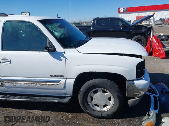 2003 GMC Yukon SLT with VIN 1GKEC13Z13J197955, listed as a IAAI auction lot 41586841 with 208,752 mi miles. Bid and sale history available at carsss.com. Image 17.