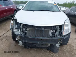 2012 Cadillac SRX Performance Collection with VIN 3GYFNEE32CS658275, listed as a IAAI auction lot 42514540 with 131,588 mi miles and . Bid and sale history available at DreamBid. Image 6.