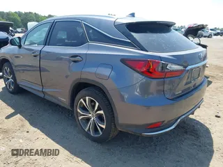 2021 Lexus RX 450h with VIN 2T2HGMDA6MC065516, listed as a IAAI auction lot 42162407 with 81,501 mi miles and . Bid and sale history available at DreamBid. Image 3.