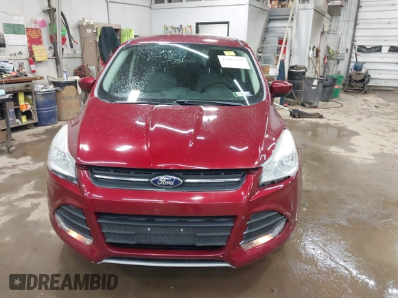 2013 Ford Escape SE with VIN 1FMCU9GX1DUC56361, listed as a IAAI auction lot 42042233 with 136,441 mi miles and . Bid and sale history available at DreamBid. Image 12.