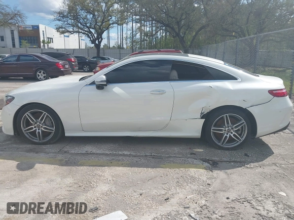 2019 Mercedes-Benz E 450 with VIN WDD1J6HB8KF074413, listed as a IAAI auction lot 41691118 with 50,208 mi miles and . Bid and sale history available at DreamBid. Image 14.