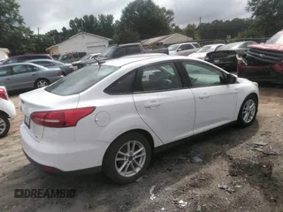 2017 Ford Focus SE with VIN 1FADP3F25HL287004, listed as a IAAI auction lot 42691098 with 94,833 mi miles and . Bid and sale history available at DreamBid. Image 4.