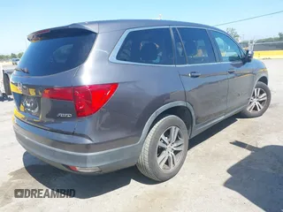 2017 Honda Pilot EX-L with VIN 5FNYF6H59HB032480, listed as a IAAI auction lot 42488789 with 112,595 mi miles and . Bid and sale history available at DreamBid. Image 4.