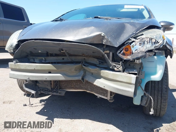 2015 Ford Fiesta SE with VIN 3FADP4BJ1FM217045, listed as a IAAI auction lot 42120444 with 119,207 mi miles and . Bid and sale history available at DreamBid. Image 6.