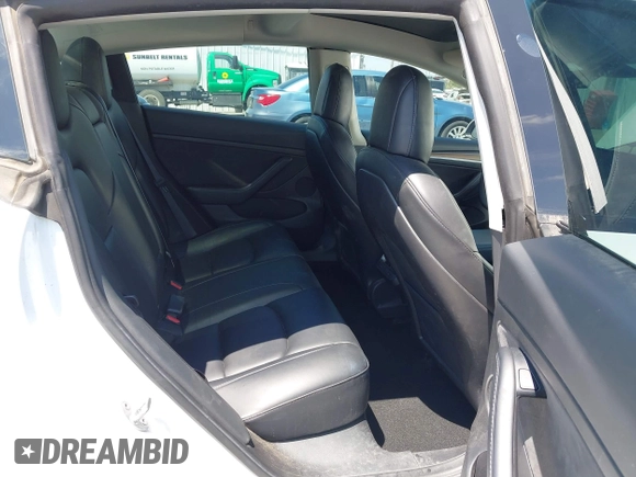 2022 Tesla Model 3 Long Range z VIN 5YJ3E1EB9NF113601, wystawiony jako IAAI lot #42173612 z przebiegiem 95 454 mil mil oraz . Historia ofert i sprzedaży dostępna na DreamBid. Obrazek 8.