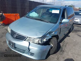 2003 Honda Odyssey EX-L with VIN 5FNRL18923B071598, listed as a IAAI auction lot 41947046 with 224,394 mi miles and . Bid and sale history available at DreamBid. Image 2.