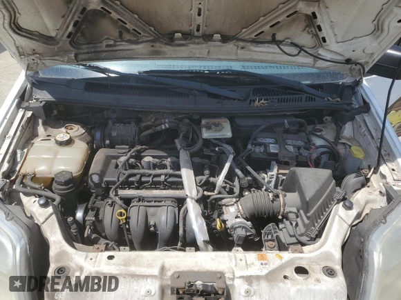 2012 Ford Transit Connect XL z VIN NM0LS7AN3CT091551, wystawiony jako Copart lot #52896345 z przebiegiem 168 224 mil mil oraz Szkoda całkowita • Salvage title. Historia ofert i sprzedaży dostępna na DreamBid. Obrazek 12.