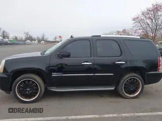 2012 GMC Yukon Denali with VIN 1GKS2EEF5CR129160, listed as a IAAI auction lot 42012417 with 221,871 mi miles. Bid and sale history available at carsss.com. Image 14.