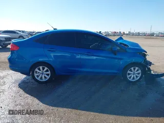 2012 Ford Fiesta SE with VIN 3FADP4BJ2CM115295, listed as a IAAI auction lot 41609949 with Not Provided miles. Bid and sale history available at carsss.com. Image 14.