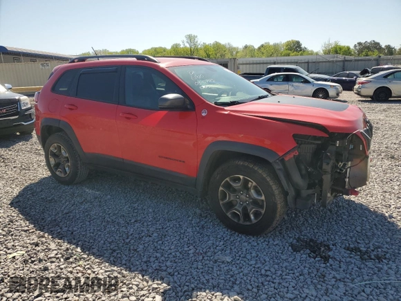 2019 Jeep Cherokee Trailhawk with VIN 1C4PJMBX2KD147090, listed as a Copart auction lot 52435815 with 101,043 mi miles and Salvage Title. Bid and sale history available at DreamBid. Image 4.