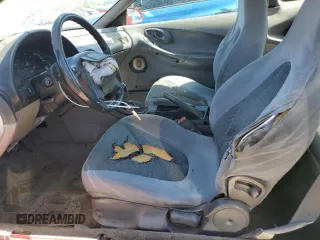1993 Ford Probe z VIN 1ZVCT20A1P5218841, wystawiony jako Copart lot #56752065 z przebiegiem 289 913 mil mil oraz Tytuł czysty. Historia ofert i sprzedaży dostępna na DreamBid. Obrazek 7.