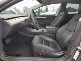 2023 Tesla Model 3 with VIN 5YJ3E1EA4PF642769, listed as a Copart auction lot 50648825 with 25,310 mi miles and Salvage title. Bid and sale history available at DreamBid. Image 7.