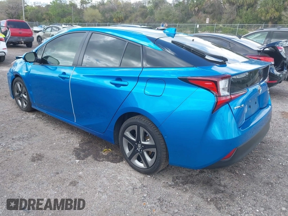 2022 Toyota Prius L Eco with VIN JTDKAMFU5N3165006, listed as a IAAI auction lot 41753470 with 33,567 mi miles and . Bid and sale history available at DreamBid. Image 3.