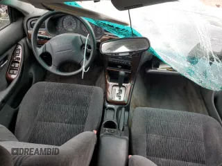 2000 Subaru Legacy Outback z VIN 4S3BH6752Y7648304, wystawiony jako Copart lot #77252914 z przebiegiem Nie podano mil oraz Szkoda całkowita • Salvage title. Historia ofert i sprzedaży dostępna na DreamBid. Obrazek 8.