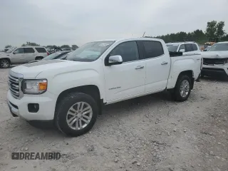 2015 GMC Canyon 4WD SLT with VIN 1GTG6CE30F1138996, listed as a Copart auction lot 61426165 with 186,076 mi miles and Clean title. Bid and sale history available at DreamBid. Image 1.