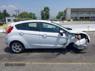 2018 Ford Fiesta SE z VIN 3FADP4EJ8JM141067, wystawiony jako IAAI lot #42417301 z przebiegiem 71 150 mil mil oraz . Historia ofert i sprzedaży dostępna na DreamBid. Obrazek 13.