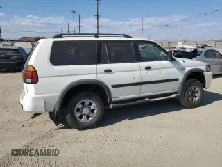 2003 Mitsubishi Montero ES z VIN JA4LS21H03J037761, wystawiony jako Copart lot #70692474 z przebiegiem 181 359 mil mil oraz Szkody całkowita. Historia ofert i sprzedaży dostępna na DreamBid. Obrazek 3.
