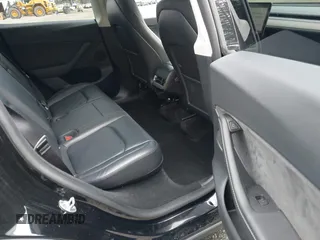 2024 Tesla Model Y with VIN 7SAYGDED3RF119101, listed as a IAAI auction lot 42019817 with 35,714 mi miles and . Bid and sale history available at DreamBid. Image 8.
