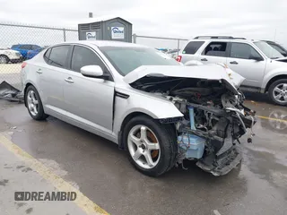 2013 Kia Optima EX z VIN 5XXGN4A75DG188070, wystawiony jako IAAI lot #41371974 z przebiegiem 217 020 mil mil oraz . Historia ofert i sprzedaży dostępna na DreamBid. Obrazek 1.