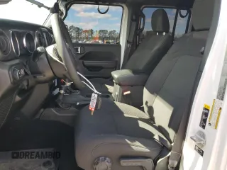2023 Jeep Gladiator Sport S with VIN 1C6HJTAG4PL556387, listed as a Copart auction lot 47453305 with 35,611 mi miles and Salvage title. Bid and sale history available at DreamBid. Image 7.